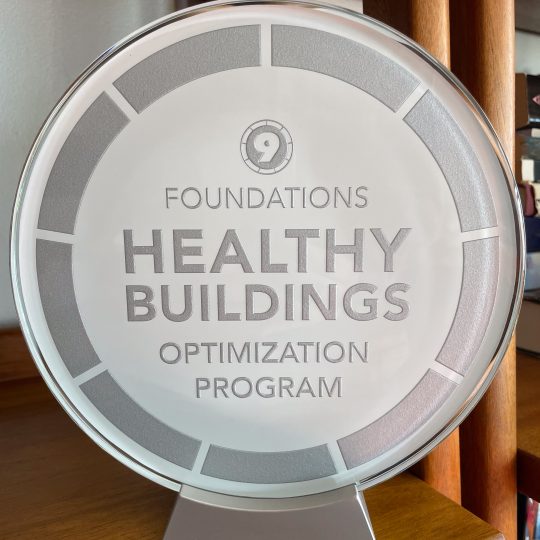 9F Healthy Buildings Optimization Program Shield on a stand.
